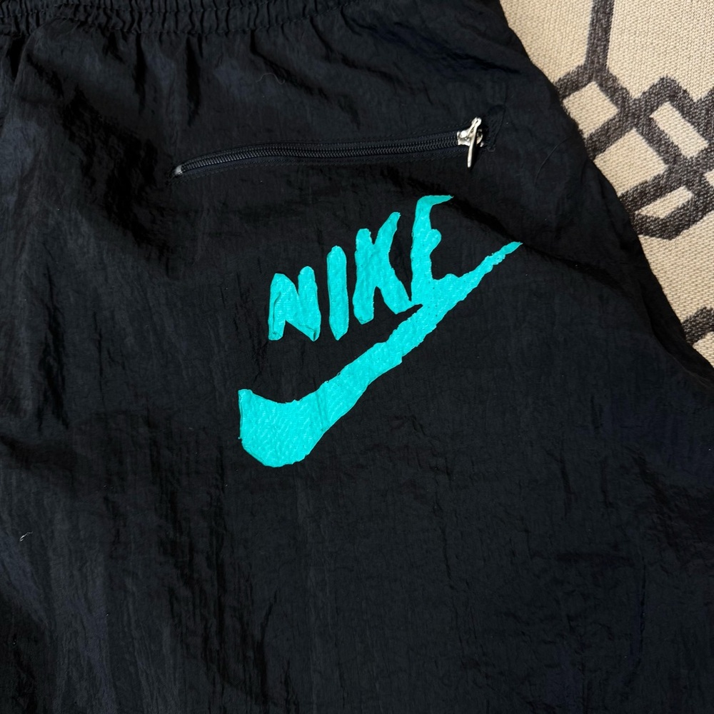 Nike Black Joggers with Teal Logo